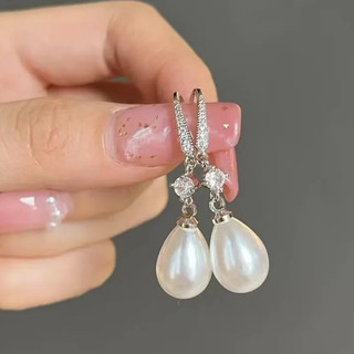 Bright Dangling Pearl Earrings